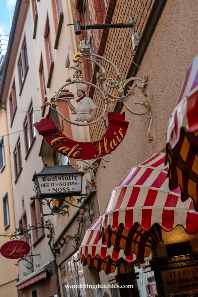 Signboard of Café Flair in the narrow streets of Cochem, Germany.