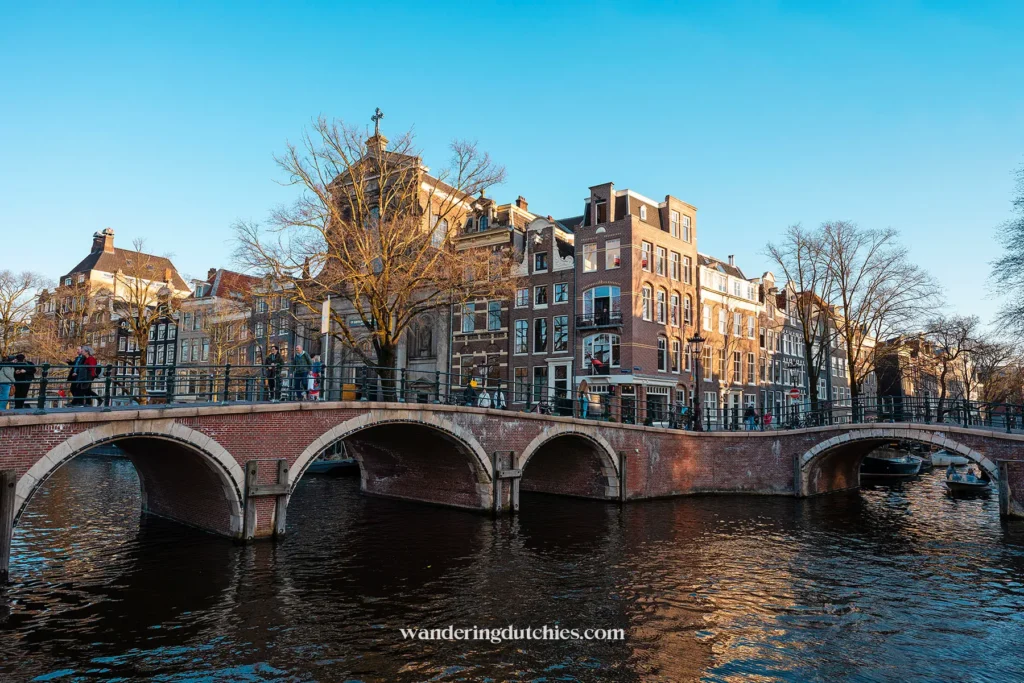 Bridges and canals in the center of Amsterdam at sunset