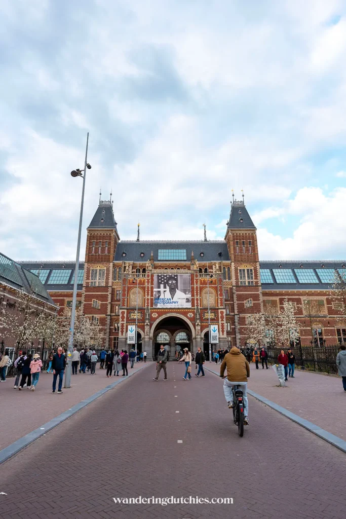 Cyclists and visitors outside the Rijksmuseum in Amsterdam